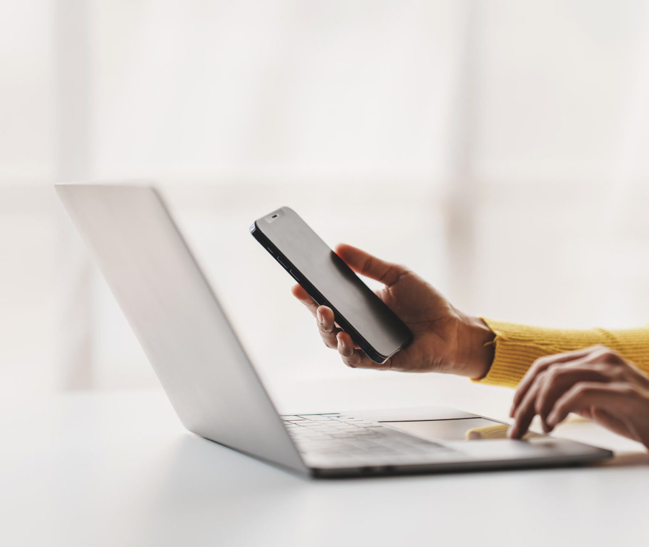Type search information from the Internet network. Businessman working with smartphone, tablet and laptop computer on table in office. network concept